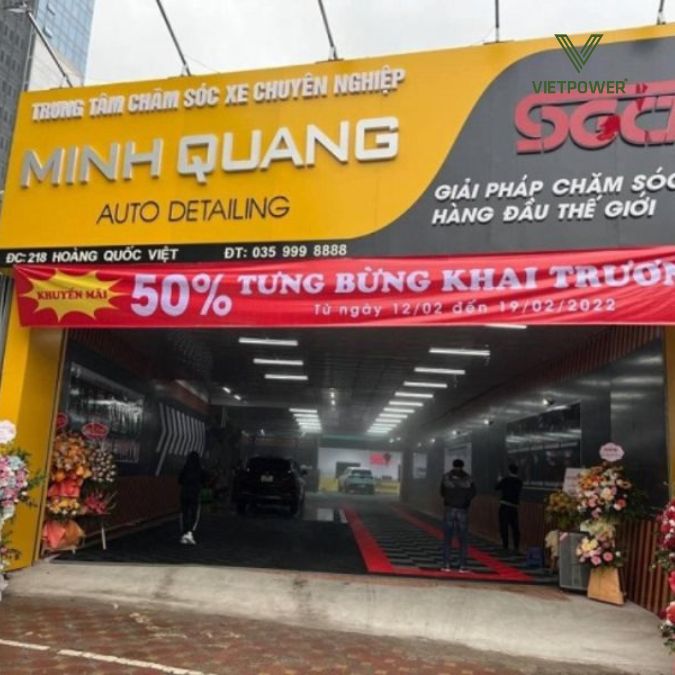 mẫu băng rôn khai trương treo trước trung tâm chăm sóc xe ô tô
